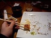 Answer sushi,sesame seeds,chopsticks