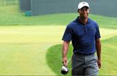 Answer Tiger Woods, golf driver, golf course