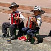 Answer musicians, accordion, sidewalk